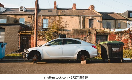 Gateshead UK: 21st Nov 2020: A Car With No Wheels On Bricks Awaiting Repairs