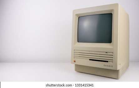 Gateshead, United Kingdom - March 6th 2019: Apple Macintosh SE Vintage Retro, With Rainbow Logo, 80's Early 90's Personal Computer On White Background