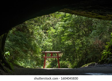 Gateway To A Sacred Space Torii From Inside The Cave