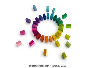 Gathering, centralization of data and people, concept image.
Circle of colorful wooden blocks representing unity of diverse elements. Isolated on neutral white.