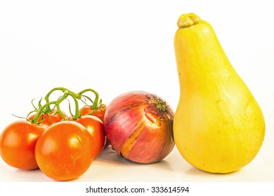 Gathering Ingredients For Butternut Squash Casserole.  Closeup On White Background With Copy Space