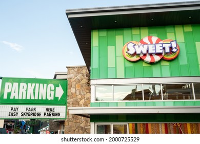 Gatlinburg, Tennessee, US - June 27, 2021: Exterior Signage For Sweet, A Tourist Candy Shop Selling All Types Of Sugary Treats For The Whole Family In The Entertainment District Downtown 