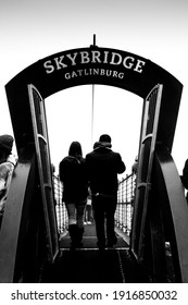 Gatlinburg, TN, United States - February 14, 2021: A Young Couple Steps Out On The Gatlinburg Sky Bridge As They Celebrate Valentine's Day. 