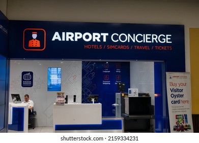 Gatwick Airport, UK- May 3, 2022: Airport Concierge Desk At Gatwick Airport