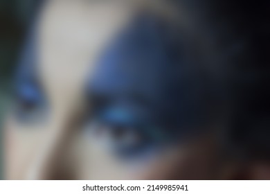 Gaussian Blur Image Of Asian Woman Face With Excessive Eye Make Up 