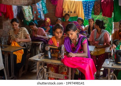 Gautam Budh Nagar, Uttar Pradesh, India-Sep 12 2016: Girls And Women Learning Stitching And Tailoring Under Vocational Training Course. Empowering Women Through Stitching  Tailoring Classes