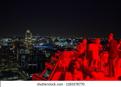 Gauteng, Johannesburg,12,03,2016 Rooftop Party With City Scape In Red