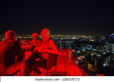 Gauteng, Johannesburg,12,03,2016 Rooftop Party With City Scape In Red