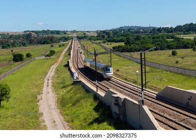 Gautrain, High Speed Train Traveling From Pretoria To Sandton Going Past Solomon Mahlangu Drive, Gauteng, South Africa.