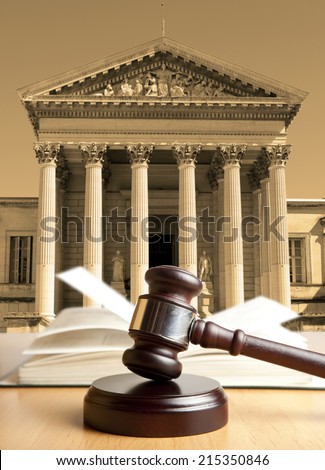 Gavel against the background of the courthouse