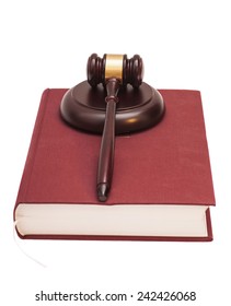Gavel and book on white background 