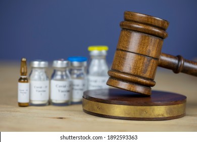 Gavel And Different Vaccines, Law And Vaccination Concept