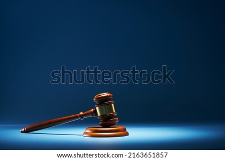 gavel hammer against blue background   Stockfoto © 