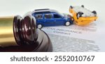 Gavel judge with car accident litigation for insurance coverage claim. Car accident and judgment