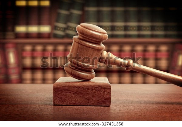 The gavel of a judge in\
court