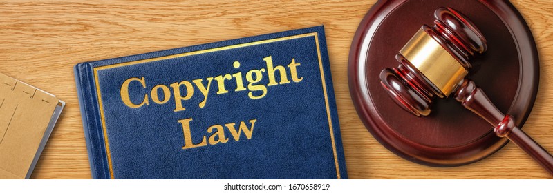 A Gavel With A Law Book - Copyright Law