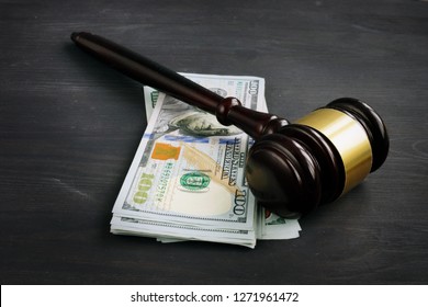 Gavel And Money In The Court. Penalty Or Bribe.