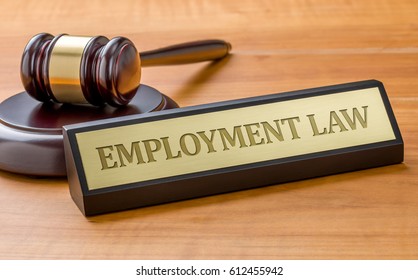 A Gavel And A Name Plate With The Engraving Employment Law