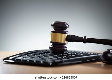 Gavel On Computer Keyboard Concept For Online Internet Auction Or Legal Assistance