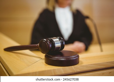 Gavel resting on sounding block in the court room - Powered by Shutterstock