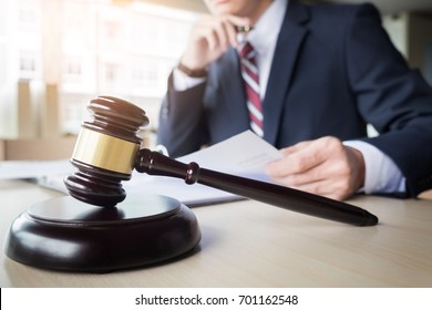 gavel and soundblock fo justice law and lawyer working on wooden desk background