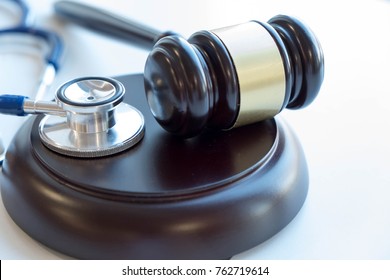 Gavel And Stethoscope. Medical Jurisprudence. Legal Definition Of Medical Malpractice. Attorney. Common Errors Doctors, Nurses And Hospitals Make.