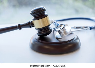 Gavel And Stethoscope. Medical Jurisprudence. Legal Definition Of Medical Malpractice. Attorney. Common Errors Doctors, Nurses And Hospitals Make.