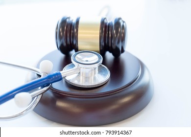 Gavel And Stethoscope. Medical Jurisprudence. Legal Definition Of Medical Malpractice. Attorney. Common Errors Doctors, Nurses And Hospitals Make.