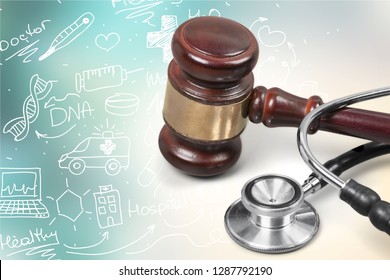 Gavel And Stethoscope  On Background, Symbol Photo For Bungling And Medical Error