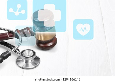 Gavel And Stethoscope  On Background, Symbol Photo For Bungling And Medical Error