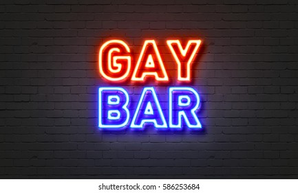 Gay Bar Neon Sign On Brick Wall Background