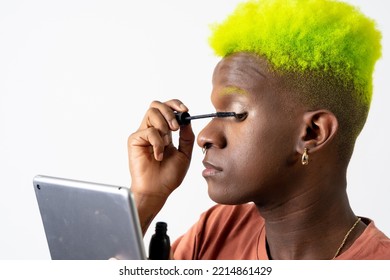 A Gay Black Man Putting On Makeup, LGBTI Concept, Putting On Eyeshadow