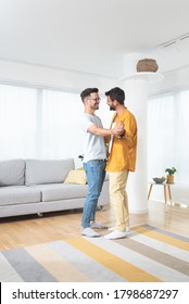 Gay Couple Dancing At Home