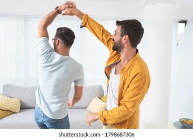 Gay Couple Dancing At Home