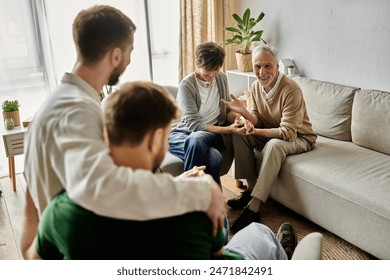 A gay couple introduces their partners to parents in a heartwarming scene. - Powered by Shutterstock