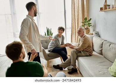 A gay couple introduces their partners to parents in a home setting. - Powered by Shutterstock