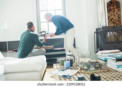 Gay Couple Listening To Vinyl Records