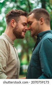 Gay Couple Looking At Each Other On The Park	
