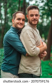 Gay Couple Looking At Each Other On The Park	
