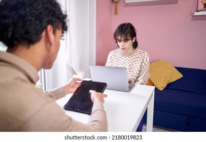 Gay Couple Couple Looking At Laptop