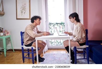 Gay Couple Couple Looking At Laptop