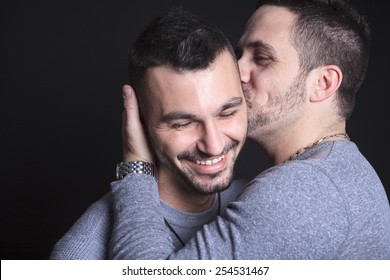 A Gay Couple On Black Background Studio