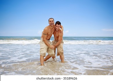 Gay couple on vacation at the beach