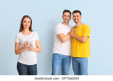 Gay couple and pregnant woman with money on color background