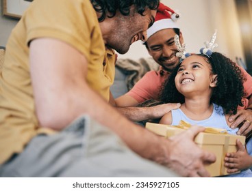 Gay father, child and Christmas gift with present, house or celebration on festive holiday with smile, love or care. LGBTQ men, parents and girl kid with box, xmas fashion or culture in family home - Powered by Shutterstock