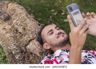 Gay Man Shopping Online On Cellphone