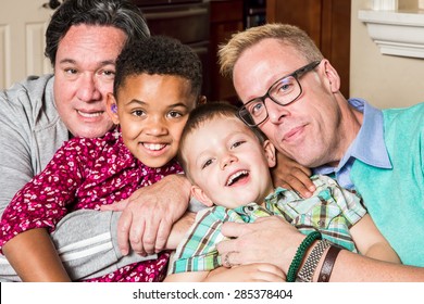 Gay Parents And Their Children Pose For A Photo