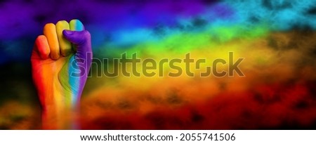Gay pride concept. Hand drawn with a rainbow. Gay pride lgbt b rainbow flag. Fist symbol LGBT