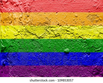 Gay pride flag painted on grunge wall