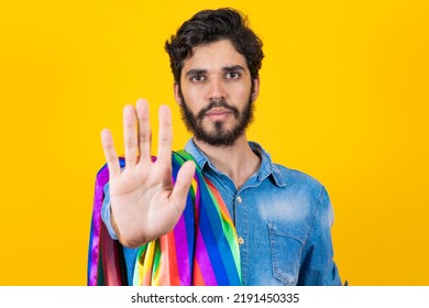 Gay Pride. Homosexual Boy With His Hand Forward Making A Stop Sign To Prejudice